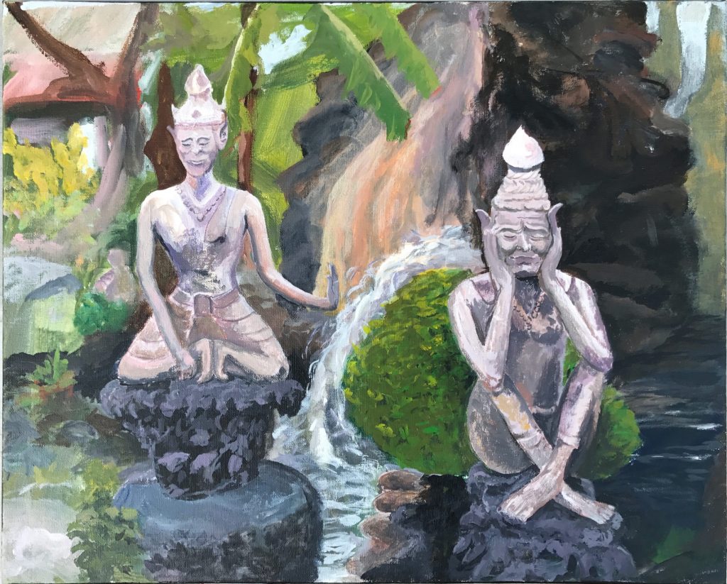 Two statues in the imperial garden in Bangkok