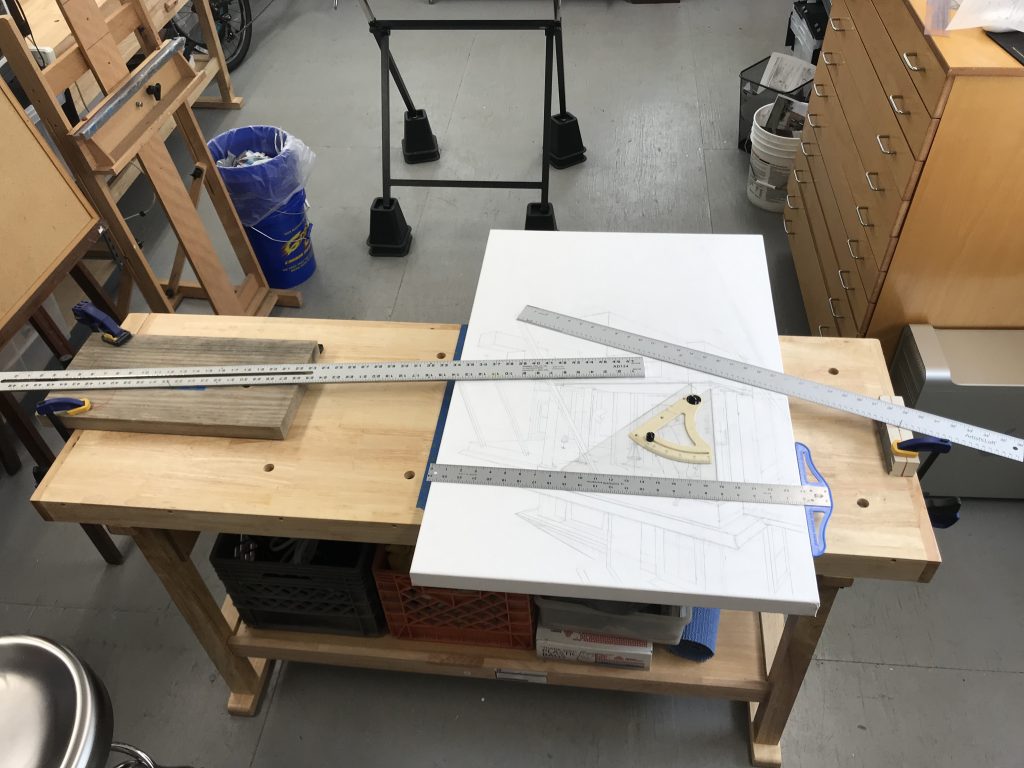 Table with vanishing points pinned, to help with calculating and drawing perspective